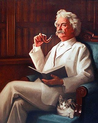 Mark Twain con uno de sus gatos